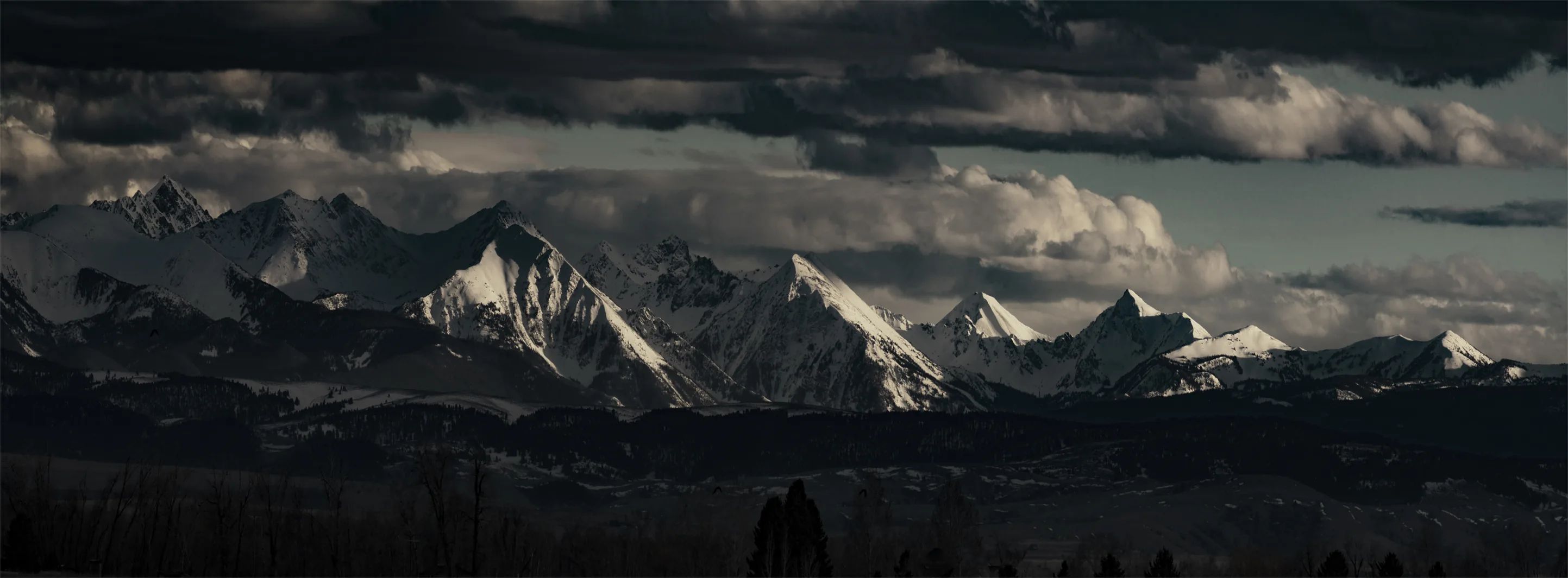 Layered distant mountain ranges in haze
